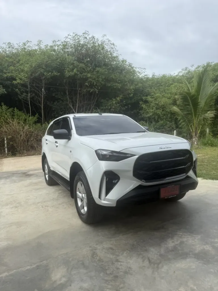 Our white SUV for four passengers
